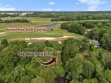 Experience the best of both worlds in this beautifully appointed on HawksHead Links in Michigan - for sale on GolfHomes.com, golf home, golf lot