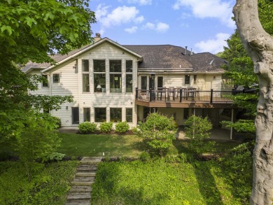 Experience the best of both worlds in this beautifully appointed on HawksHead Links in Michigan - for sale on GolfHomes.com, golf home, golf lot