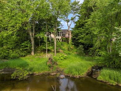 Experience the best of both worlds in this beautifully appointed on HawksHead Links in Michigan - for sale on GolfHomes.com, golf home, golf lot