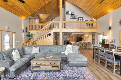 Spacious residence bordering the #7 hole at Cedar Creek Golf on  in Wyoming - for sale on GolfHomes.com, golf home, golf lot