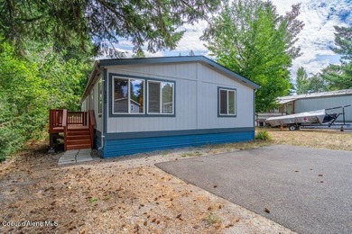 Tucked into a quiet Hayden community, this newly updated on Hayden Lake Country Club in Idaho - for sale on GolfHomes.com, golf home, golf lot