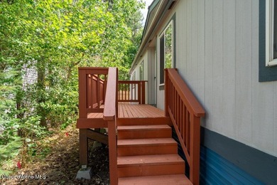 Tucked into a quiet Hayden community, this newly updated on Hayden Lake Country Club in Idaho - for sale on GolfHomes.com, golf home, golf lot