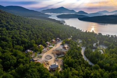 Discover the epitome of Adirondack luxury at The Lodges! The on Whiteface Club and Resort in New York - for sale on GolfHomes.com, golf home, golf lot