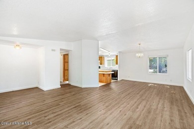 Tucked into a quiet Hayden community, this newly updated on Hayden Lake Country Club in Idaho - for sale on GolfHomes.com, golf home, golf lot