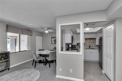 55+ COMMUNITY. GORGEOUS, TWO-BEDROOM/1.5 BATHS, SECOND-FLOOR END on Rolling Greens Executive Golf Community in Florida - for sale on GolfHomes.com, golf home, golf lot