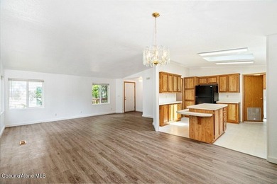 Tucked into a quiet Hayden community, this newly updated on Hayden Lake Country Club in Idaho - for sale on GolfHomes.com, golf home, golf lot