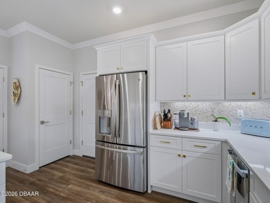 Better-than-new 4-bedroom, 3.5-bath Isles at Venetian Bay NSB on Venetian Bay Golf Course in Florida - for sale on GolfHomes.com, golf home, golf lot