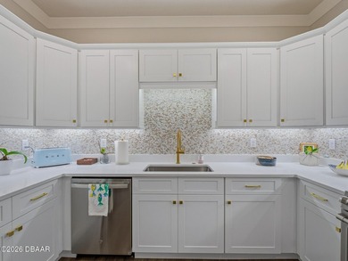 Better-than-new 4-bedroom, 3.5-bath Isles at Venetian Bay NSB on Venetian Bay Golf Course in Florida - for sale on GolfHomes.com, golf home, golf lot