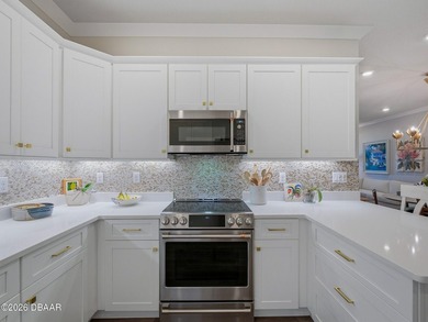 Better-than-new 4-bedroom, 3.5-bath Isles at Venetian Bay NSB on Venetian Bay Golf Course in Florida - for sale on GolfHomes.com, golf home, golf lot