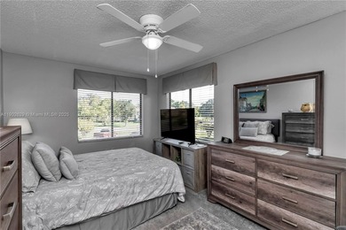 55+ COMMUNITY. GORGEOUS, TWO-BEDROOM/1.5 BATHS, SECOND-FLOOR END on Rolling Greens Executive Golf Community in Florida - for sale on GolfHomes.com, golf home, golf lot