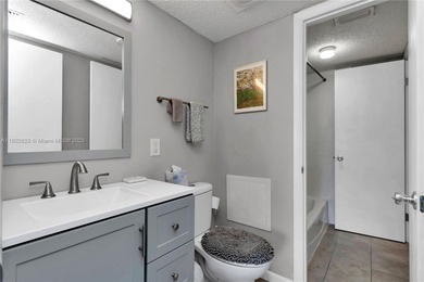 55+ COMMUNITY. GORGEOUS, TWO-BEDROOM/1.5 BATHS, SECOND-FLOOR END on Rolling Greens Executive Golf Community in Florida - for sale on GolfHomes.com, golf home, golf lot