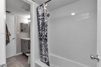 55+ COMMUNITY. GORGEOUS, TWO-BEDROOM/1.5 BATHS, SECOND-FLOOR END on Rolling Greens Executive Golf Community in Florida - for sale on GolfHomes.com, golf home, golf lot