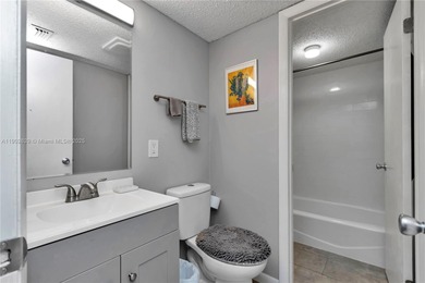 55+ COMMUNITY. GORGEOUS, TWO-BEDROOM/1.5 BATHS, SECOND-FLOOR END on Rolling Greens Executive Golf Community in Florida - for sale on GolfHomes.com, golf home, golf lot