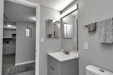 55+ COMMUNITY. GORGEOUS, TWO-BEDROOM/1.5 BATHS, SECOND-FLOOR END on Rolling Greens Executive Golf Community in Florida - for sale on GolfHomes.com, golf home, golf lot