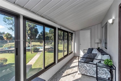 55+ COMMUNITY. GORGEOUS, TWO-BEDROOM/1.5 BATHS, SECOND-FLOOR END on Rolling Greens Executive Golf Community in Florida - for sale on GolfHomes.com, golf home, golf lot