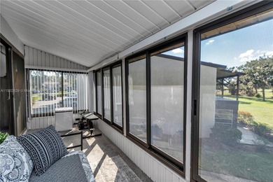 55+ COMMUNITY. GORGEOUS, TWO-BEDROOM/1.5 BATHS, SECOND-FLOOR END on Rolling Greens Executive Golf Community in Florida - for sale on GolfHomes.com, golf home, golf lot