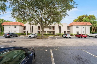 Immaculate, spacious  bright 2+/2 with extra room for use as 3rd on Woodmont Country Club in Florida - for sale on GolfHomes.com, golf home, golf lot