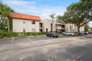 Immaculate, spacious  bright 2+/2 with extra room for use as 3rd on Woodmont Country Club in Florida - for sale on GolfHomes.com, golf home, golf lot
