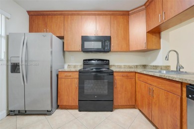 Immaculate, spacious  bright 2+/2 with extra room for use as 3rd on Woodmont Country Club in Florida - for sale on GolfHomes.com, golf home, golf lot