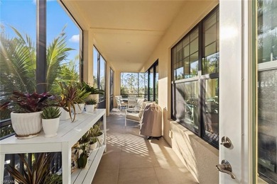 This penthouse style condo brings together a relaxed on Tiburon Golf Club in Florida - for sale on GolfHomes.com, golf home, golf lot