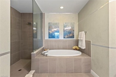 This penthouse style condo brings together a relaxed on Tiburon Golf Club in Florida - for sale on GolfHomes.com, golf home, golf lot