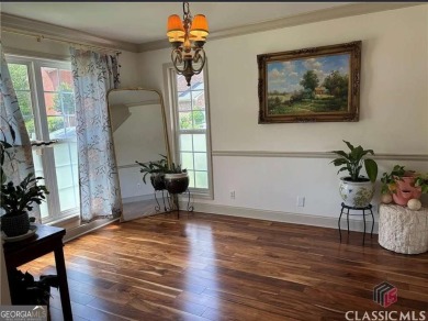 Enjoy life in this beautiful all-brick, low maintenance home in on Jennings Mill Country Club in Georgia - for sale on GolfHomes.com, golf home, golf lot