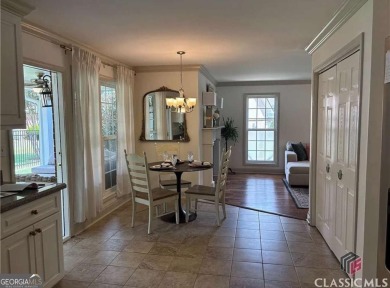 Enjoy life in this beautiful all-brick, low maintenance home in on Jennings Mill Country Club in Georgia - for sale on GolfHomes.com, golf home, golf lot