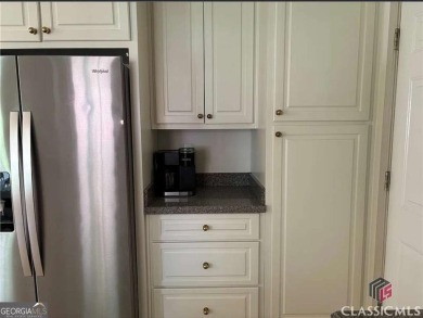 Enjoy life in this beautiful all-brick, low maintenance home in on Jennings Mill Country Club in Georgia - for sale on GolfHomes.com, golf home, golf lot