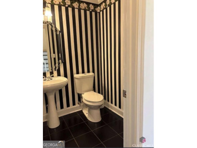 Enjoy life in this beautiful all-brick, low maintenance home in on Jennings Mill Country Club in Georgia - for sale on GolfHomes.com, golf home, golf lot