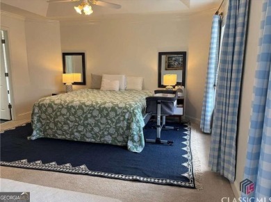 Enjoy life in this beautiful all-brick, low maintenance home in on Jennings Mill Country Club in Georgia - for sale on GolfHomes.com, golf home, golf lot
