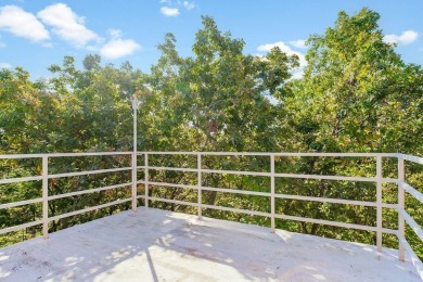 Inside the private gates of Lake Quivira, this stunning on Lake Quivira Country Club in Kansas - for sale on GolfHomes.com, golf home, golf lot