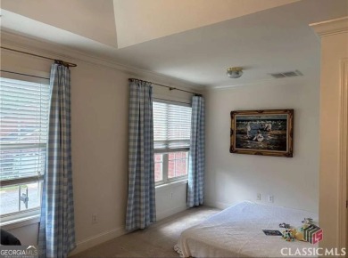 Enjoy life in this beautiful all-brick, low maintenance home in on Jennings Mill Country Club in Georgia - for sale on GolfHomes.com, golf home, golf lot