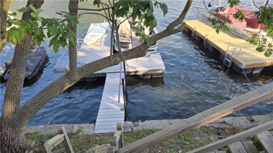 Inside the private gates of Lake Quivira, this stunning on Lake Quivira Country Club in Kansas - for sale on GolfHomes.com, golf home, golf lot