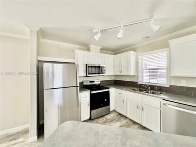 WOW! BRAND-NEW 2025 DOUBLE-WIDE MANUFACTURED HOME -- YOU OWN THE on The Club at Emerald Hills in Florida - for sale on GolfHomes.com, golf home, golf lot