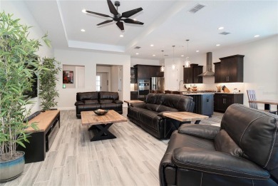 Step into a world of elegance with this practically brand-new on Mystic Dunes Resort and Golf Club in Florida - for sale on GolfHomes.com, golf home, golf lot