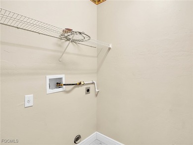 Located just blocks from Eagle Ridge Golf Club, a PUBLIC-ACCESS on Eagle Ridge Golf and Tennis Club in Florida - for sale on GolfHomes.com, golf home, golf lot