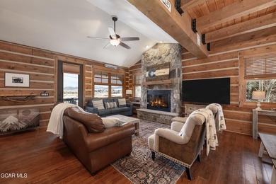 This stunning mountain retreat offers a perfect blend of rustic on Grand Elk Ranch and Club in Colorado - for sale on GolfHomes.com, golf home, golf lot