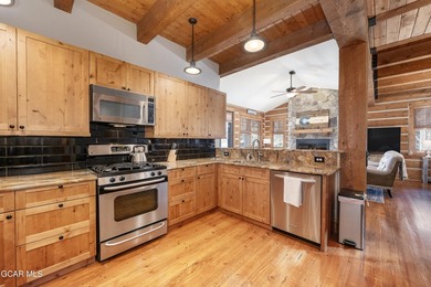 This stunning mountain retreat offers a perfect blend of rustic on Grand Elk Ranch and Club in Colorado - for sale on GolfHomes.com, golf home, golf lot