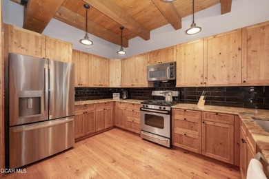 This stunning mountain retreat offers a perfect blend of rustic on Grand Elk Ranch and Club in Colorado - for sale on GolfHomes.com, golf home, golf lot