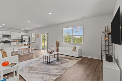 Welcome to this lifestyle-focused two-story home! Step inside on Lennon Hills Golf Course in North Carolina - for sale on GolfHomes.com, golf home, golf lot