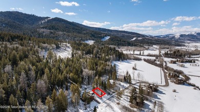 This premier Forest Cabin lot on Blackfoot Trail in Teton on Teton Springs Resort and Club in Idaho - for sale on GolfHomes.com, golf home, golf lot