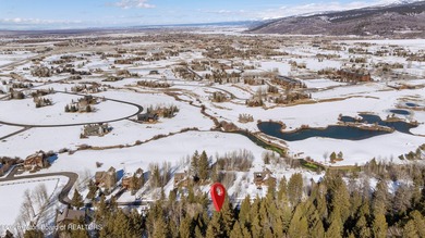 This premier Forest Cabin lot on Blackfoot Trail in Teton on Teton Springs Resort and Club in Idaho - for sale on GolfHomes.com, golf home, golf lot