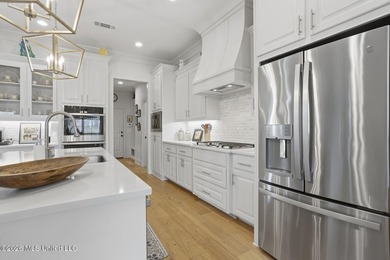 Welcome to the lap of luxury in Lake Caroline, where everyday on Lake Caroline Golf Club in Mississippi - for sale on GolfHomes.com, golf home, golf lot