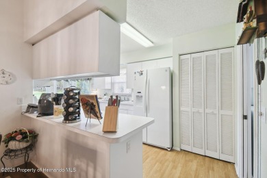This Beautiful Extended Oakmont Model End Unit Villa overlooking on Timber Pines Golf Course in Florida - for sale on GolfHomes.com, golf home, golf lot