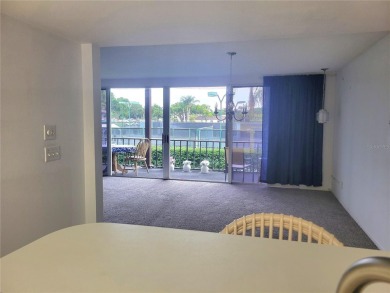 Blank Canvas !! Quiet & rare 3 bedroom, 2 bathroom oversized on Countryside Country Club in Florida - for sale on GolfHomes.com, golf home, golf lot