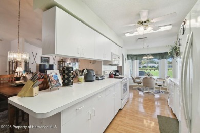 This Beautiful Extended Oakmont Model End Unit Villa overlooking on Timber Pines Golf Course in Florida - for sale on GolfHomes.com, golf home, golf lot