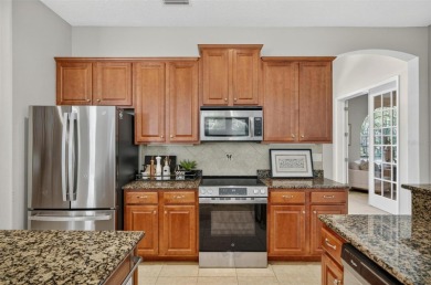 Tucked away in a quiet, tree-lined cul-de-sac in the gated Grand on Grand Haven Golf Club in Florida - for sale on GolfHomes.com, golf home, golf lot