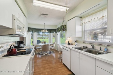 This Beautiful Extended Oakmont Model End Unit Villa overlooking on Timber Pines Golf Course in Florida - for sale on GolfHomes.com, golf home, golf lot
