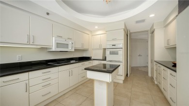 Beautifully furnished and move-in ready, this expansive on Longboat Key Golf Club Resort in Florida - for sale on GolfHomes.com, golf home, golf lot
