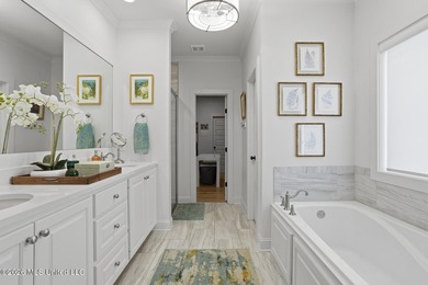 Welcome to the lap of luxury in Lake Caroline, where everyday on Lake Caroline Golf Club in Mississippi - for sale on GolfHomes.com, golf home, golf lot